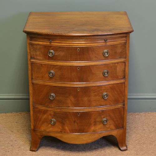 Small Edwardian Bow Fronted Mellow Mahogany Antique Chest of Drawers with Brushing Slide