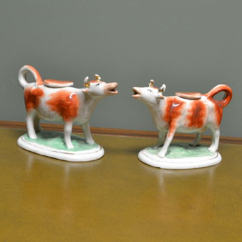 Near Pair Victorian Staffordshire Pottery Cow Creamers with Lids