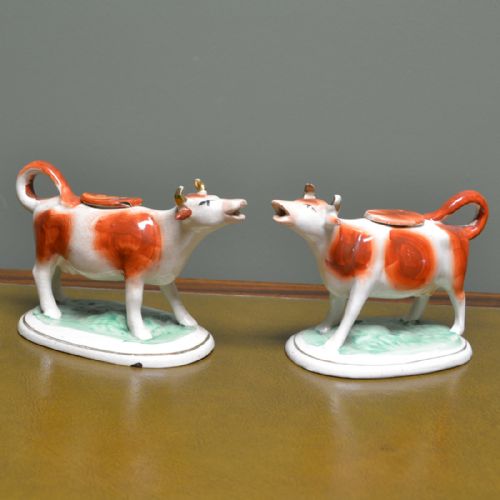 Near Pair Victorian Staffordshire Pottery Cow Creamers