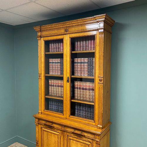 fig 1. Spectacular Gillows Golden Oak Antique Glazed Bookcase on Cupboard