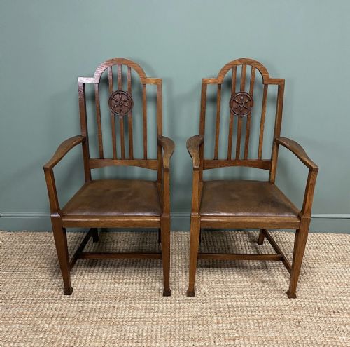 Unusual Pair of Edwardian Oak Carver Chairs by Jas. Shoolbred