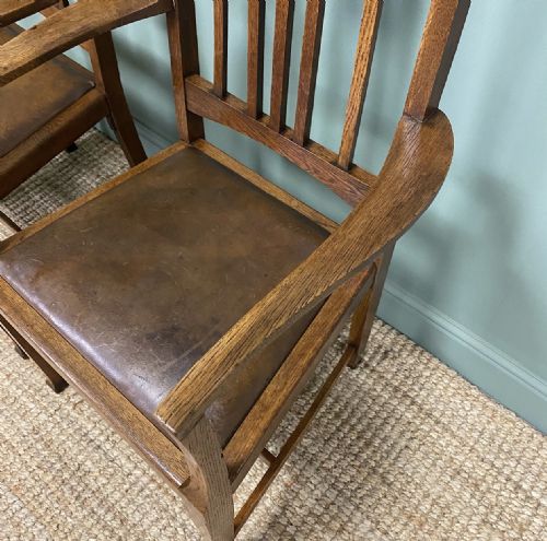 fig 2. Unusual Pair of Edwardian Oak Carver Chairs by JAS. Shoolbred