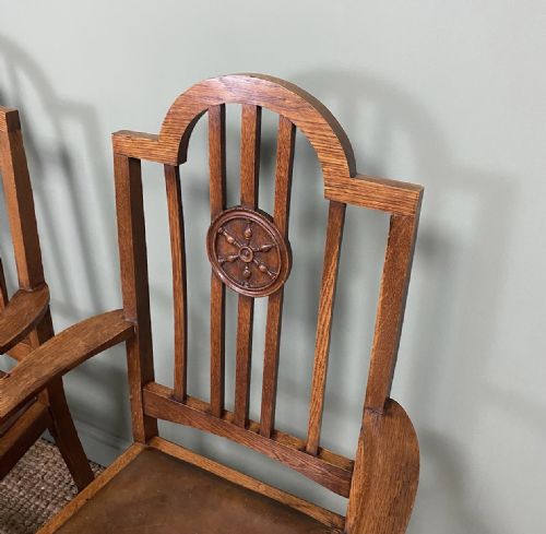 fig 3. Unusual Pair of Edwardian Oak Carver Chairs by JAS. Shoolbred