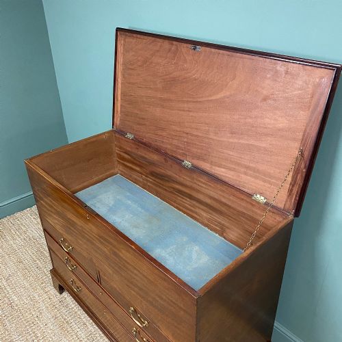 fig 2. A Georgian mahogany mule chest featuring a top hinged lid over two short drawers and two long drawers with brass swan-neck handles on bracket feet.