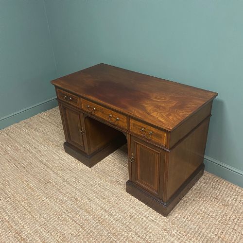 fig 2. Mahogany Antique Pedestal Desk by Maple & Co
