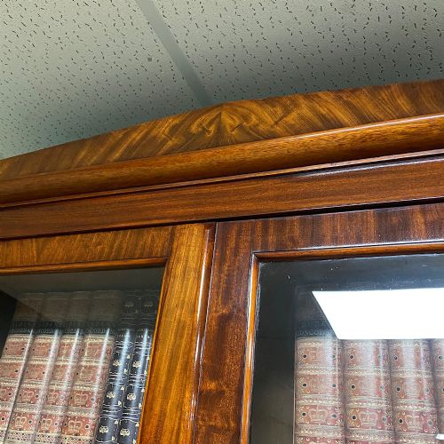 LARGE FIGURED MAHOGANY ANTIQUE GLAZED BOOKCASE ON CUPBOARD - ADDITIONAL PHOTO 1