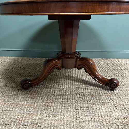 BEAUTIFULLY FIGURED MAHOGANY CIRCULAR ANTIQUE DINING TABLE - ADDITIONAL PHOTO 3