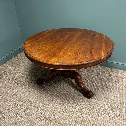 BEAUTIFULLY FIGURED MAHOGANY CIRCULAR ANTIQUE DINING TABLE - ADDITIONAL PHOTO 4