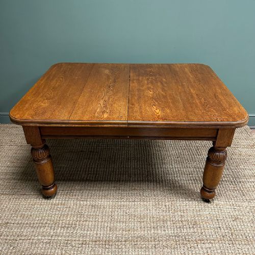LARGE VICTORIAN WIND OUT EXTENDING ANTIQUE OAK DINING TABLE - ADDITIONAL PHOTO 1