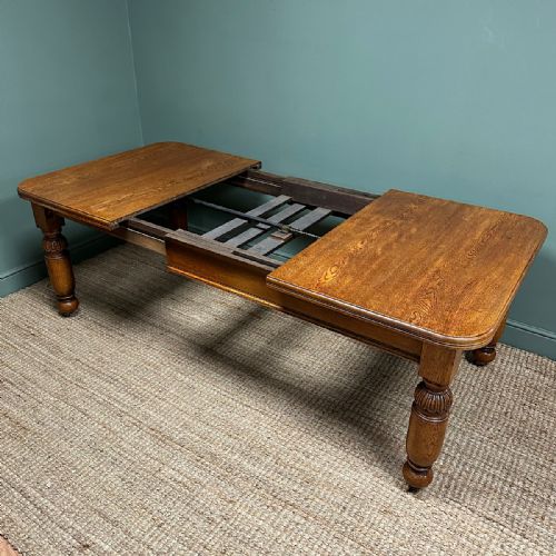 LARGE VICTORIAN WIND OUT EXTENDING ANTIQUE OAK DINING TABLE - ADDITIONAL PHOTO 2