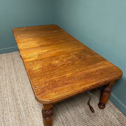 LARGE VICTORIAN WIND OUT EXTENDING ANTIQUE OAK DINING TABLE - ADDITIONAL PHOTO 3