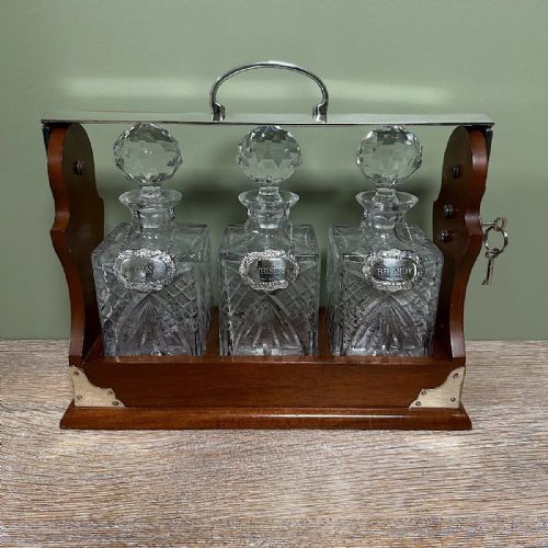 STUNNING MAHOGANY TANTALUS WITH GIN WHISKEY BRANDY SILVER DECANTER LABELS - ADDITIONAL PHOTO 1