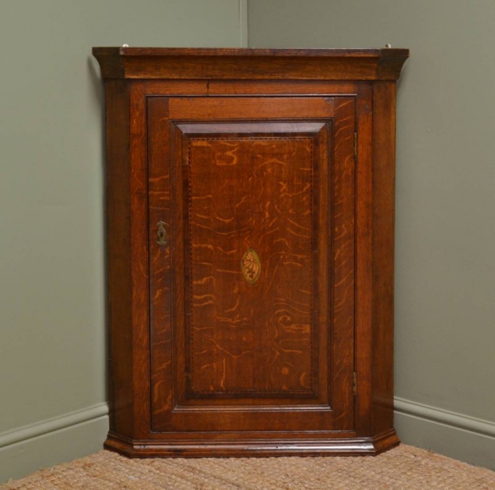 George III Oak Antique Corner Cupboard with Shell Inlay.