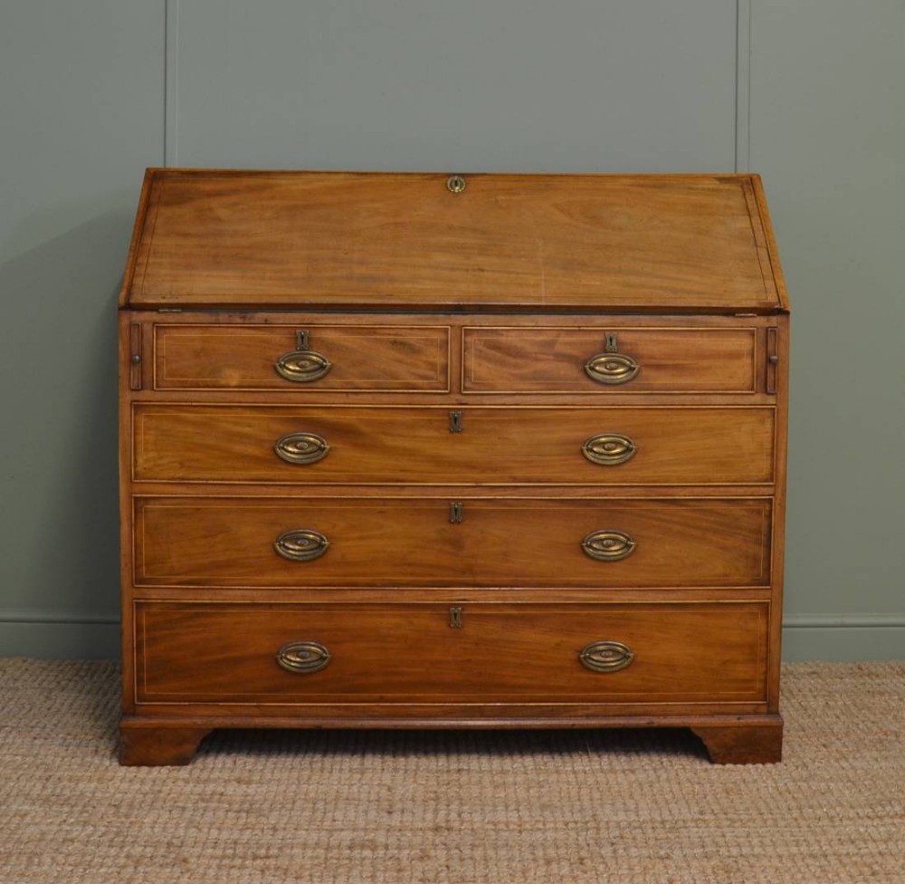 Georgian, Mellow Mahogany, Antique Bureau with Birds Eye Maple Interior.