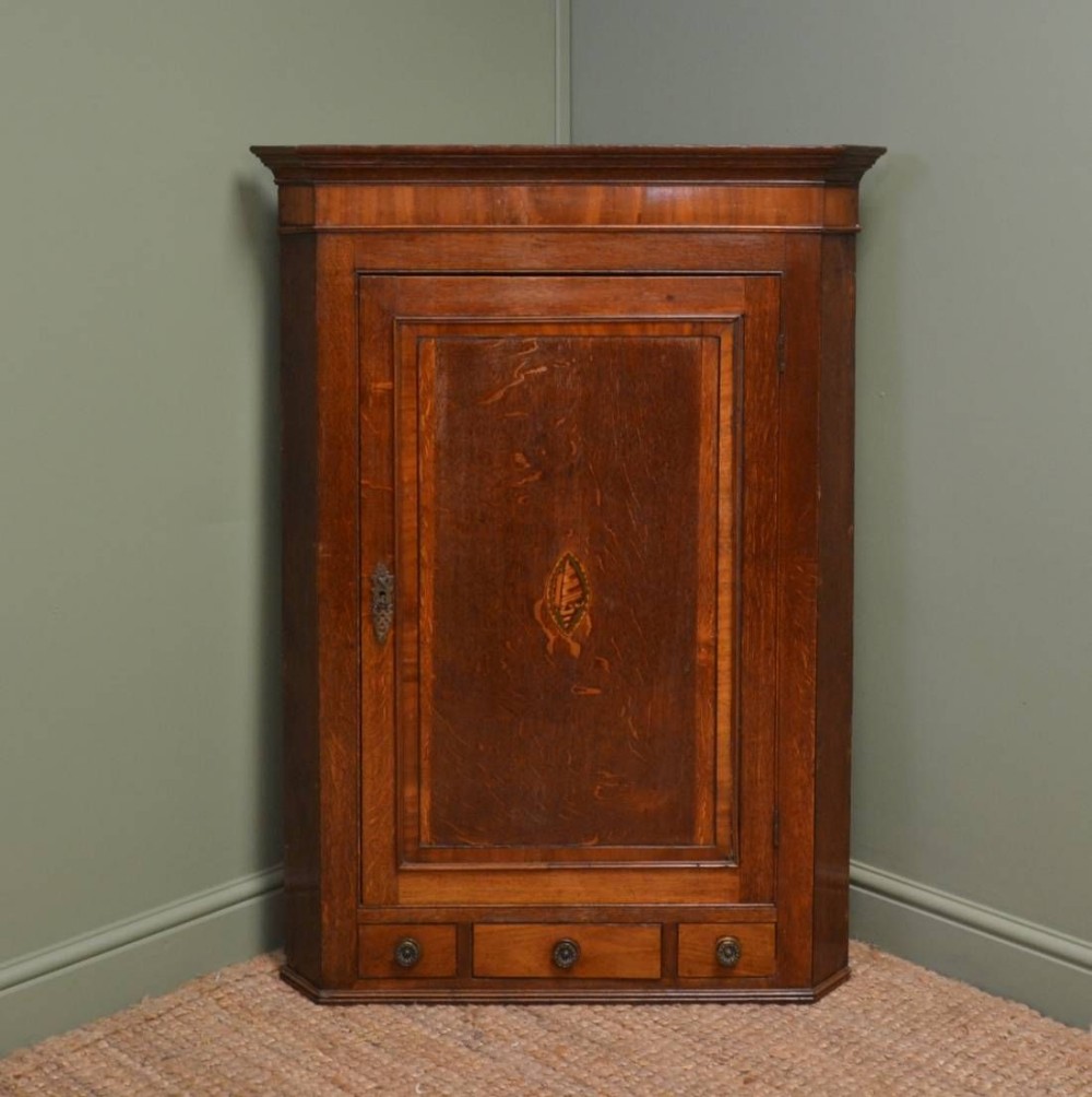 George III Country Oak Antique Corner Cupboard with Shell Inlay.