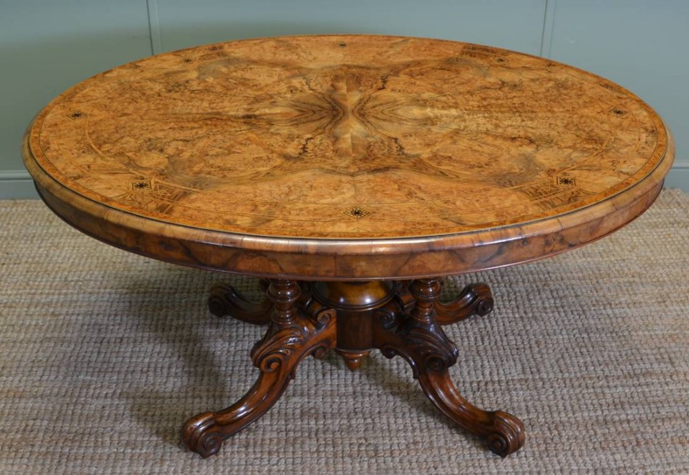 Magnificent Quality Figured Walnut Inlaid Oval Antique Dining Table.