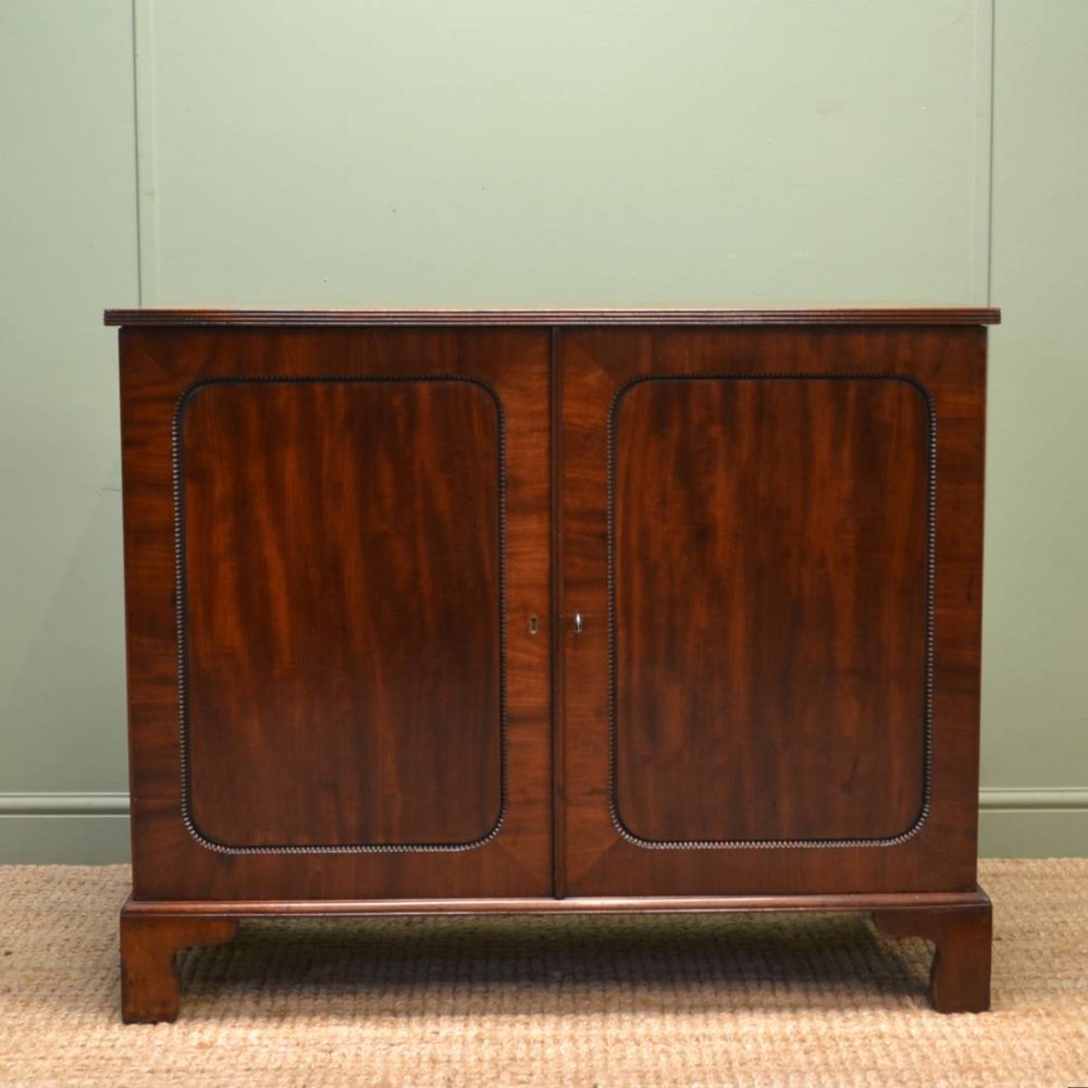 Beautifully Figured Regency Mahogany Antique Cupboard