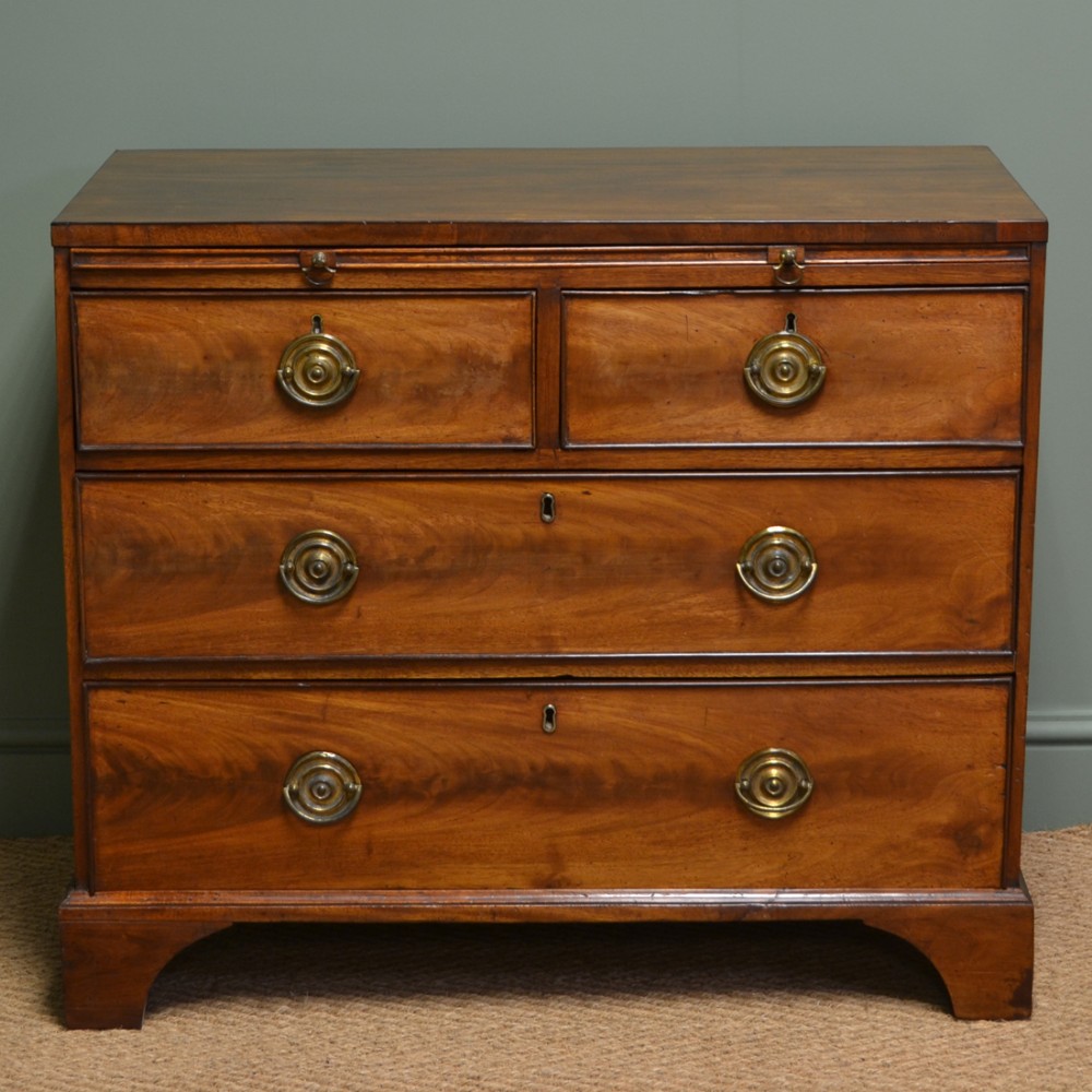 Charming Georgian Mahogany Antique Chest Of Drawers with Brushing Slide