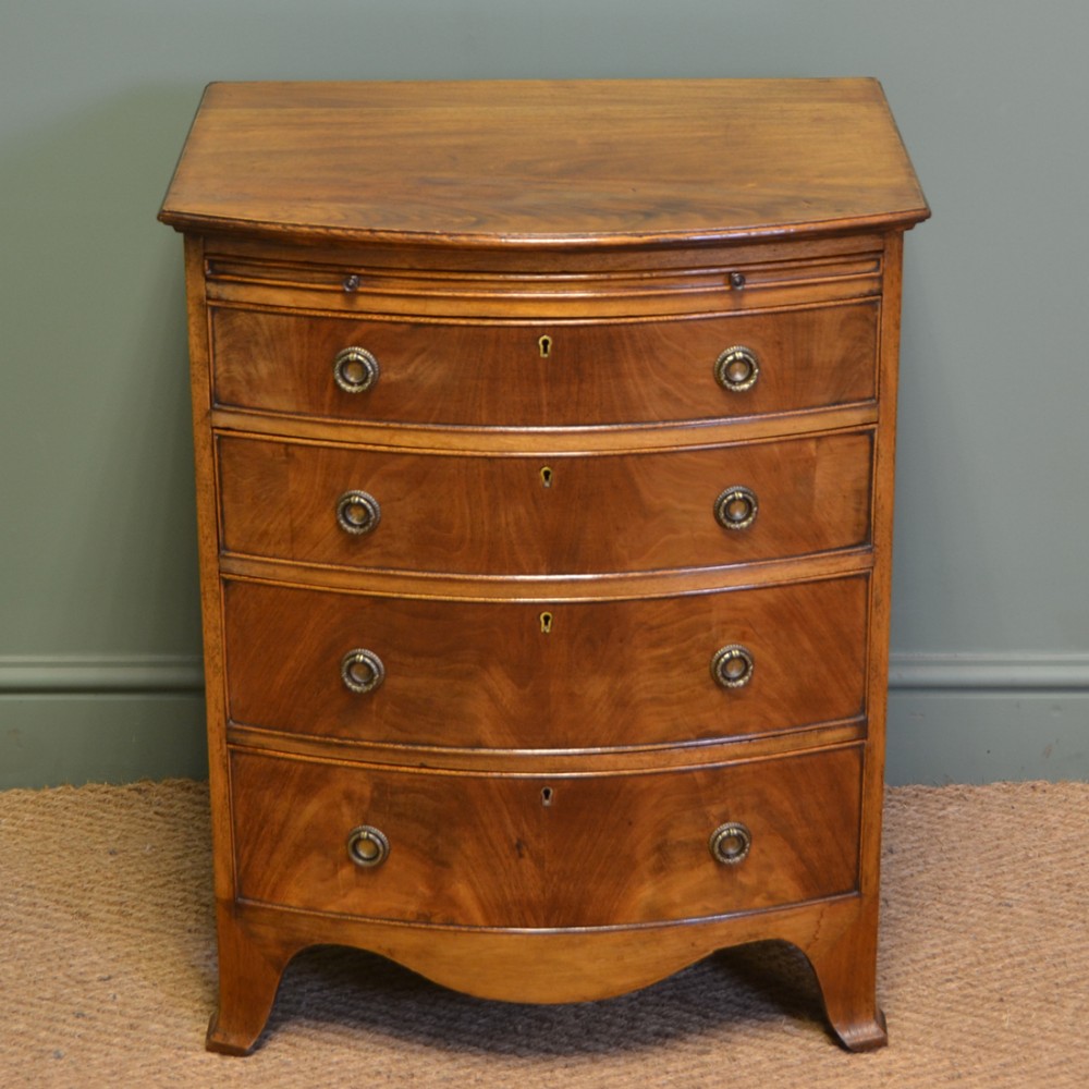 Small Edwardian Bow Fronted Mellow Mahogany Antique Chest of Drawers with Brushing Slide