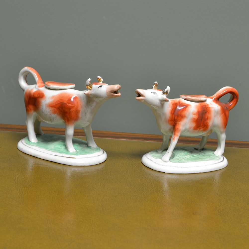 Near Pair Victorian Staffordshire Pottery Cow Creamers with Lids