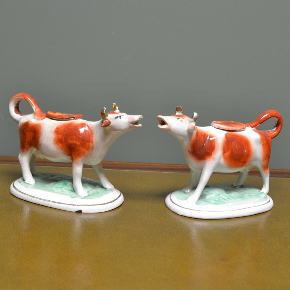 Near Pair Victorian Staffordshire Pottery Cow Creamers