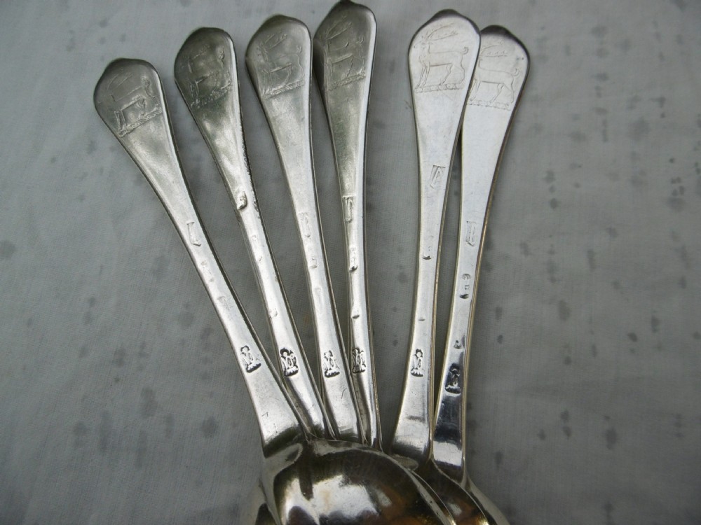 A set of six 1706 Queen Anne sterling silver dognose tablespoons arranged inside a velvet-lined wooden case. View III