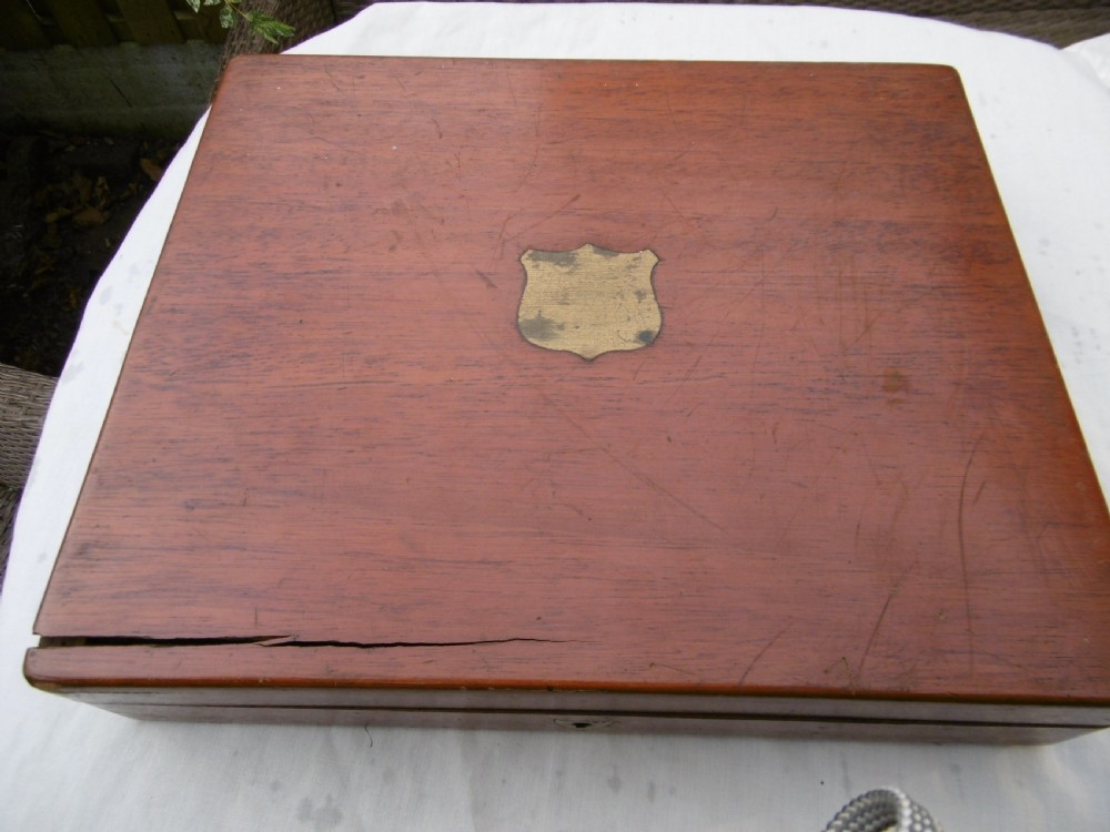 A set of six 1706 Queen Anne sterling silver dognose tablespoons arranged inside a velvet-lined wooden case. View VIII