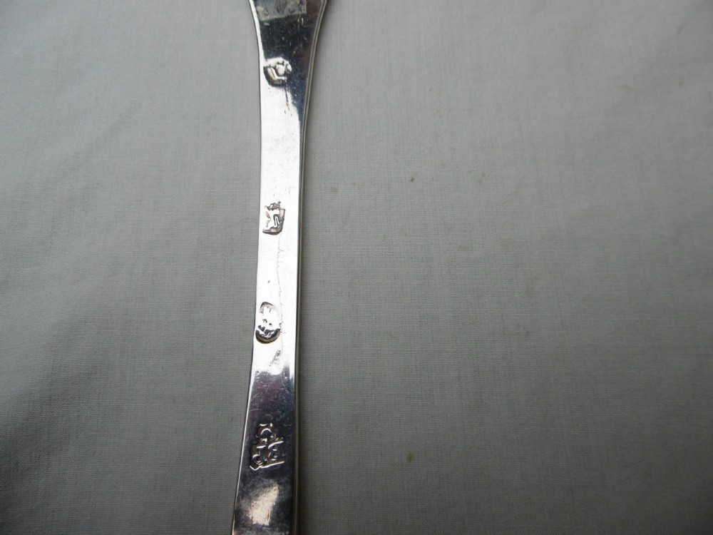 A seventeenth-century sterling silver Charles II trefid spoon featuring a notched terminal and an oval bowl. View III