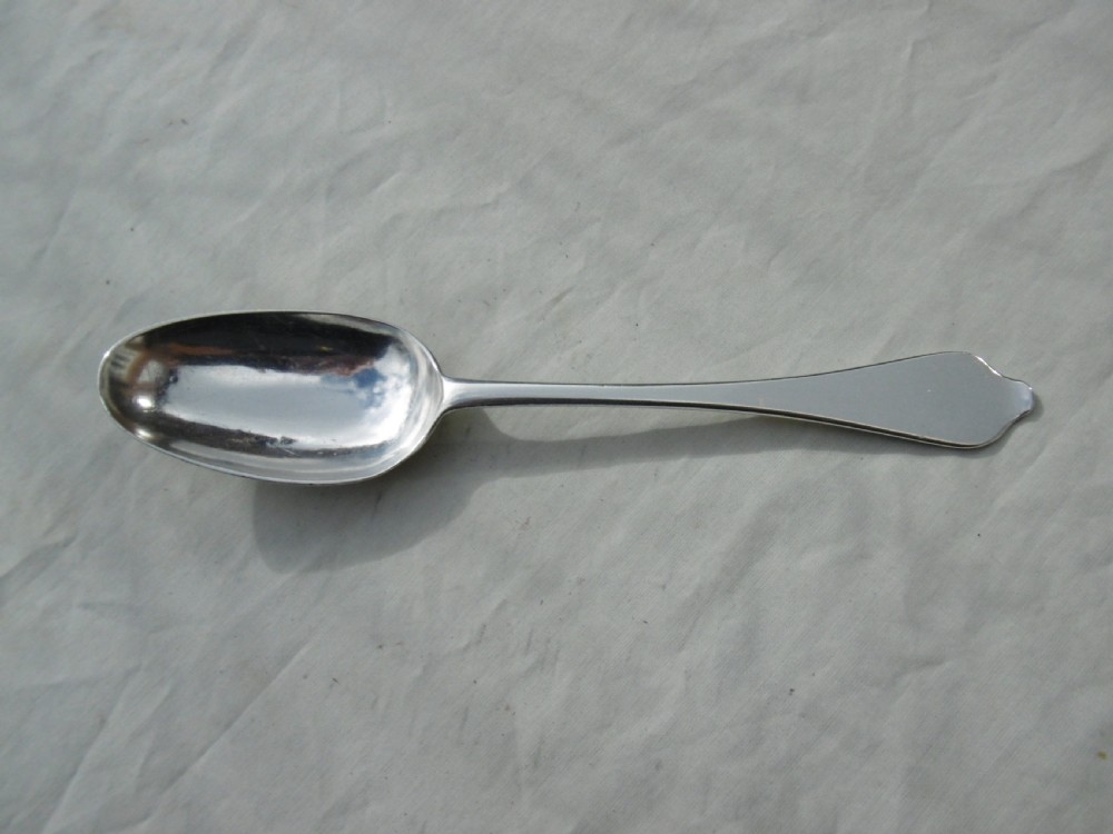 An antique 1702 Queen Anne silver dognose spoon with engraved initials on the handle and a rat-tail join on the reverse of the oval bowl. View V