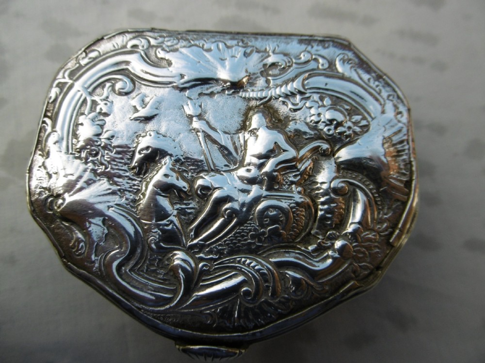 An eighteenth-century silver snuff box featuring an embossed mythological relief of Neptune on the hinged lid. View VI