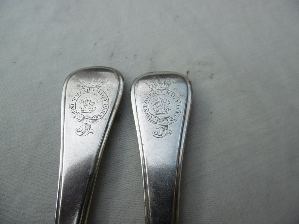 A mid-eighteenth-century sterling silver spoon and four-tined fork crafted in the Hanoverian Thread, Shell and Drop pattern. View IV