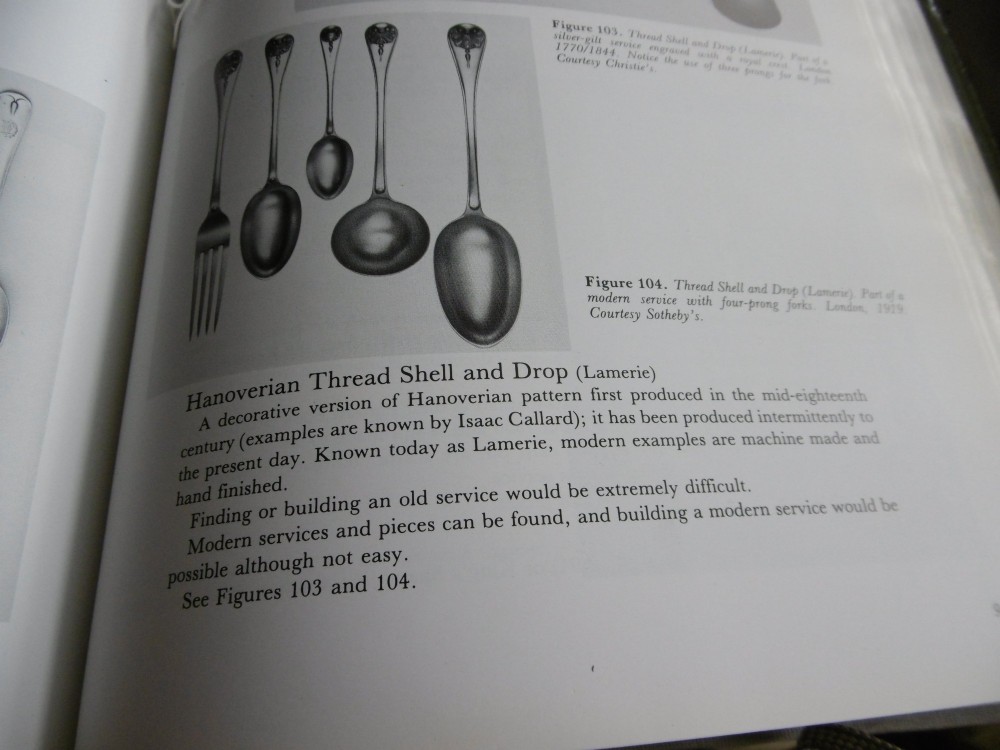 A mid-eighteenth-century sterling silver spoon and four-tined fork crafted in the Hanoverian Thread, Shell and Drop pattern. View VIII