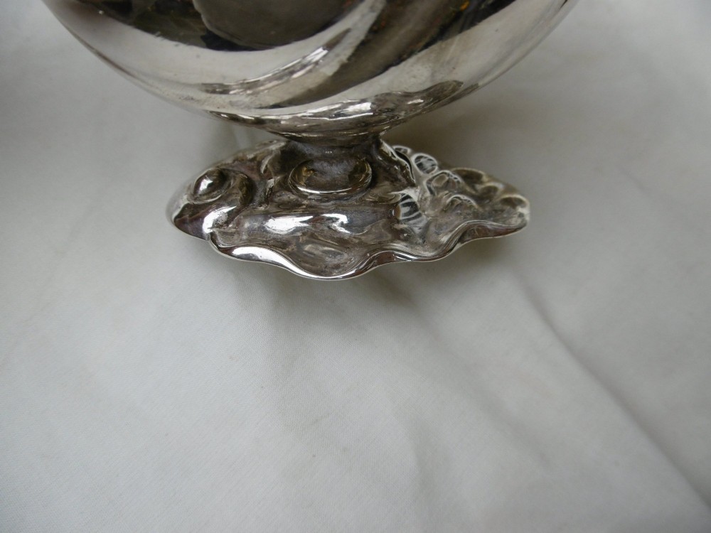 A pair of 18th-century Georgian sterling silver sauce boats featuring fluted shell bodies, serpent handles, and pedestal bases. View VII