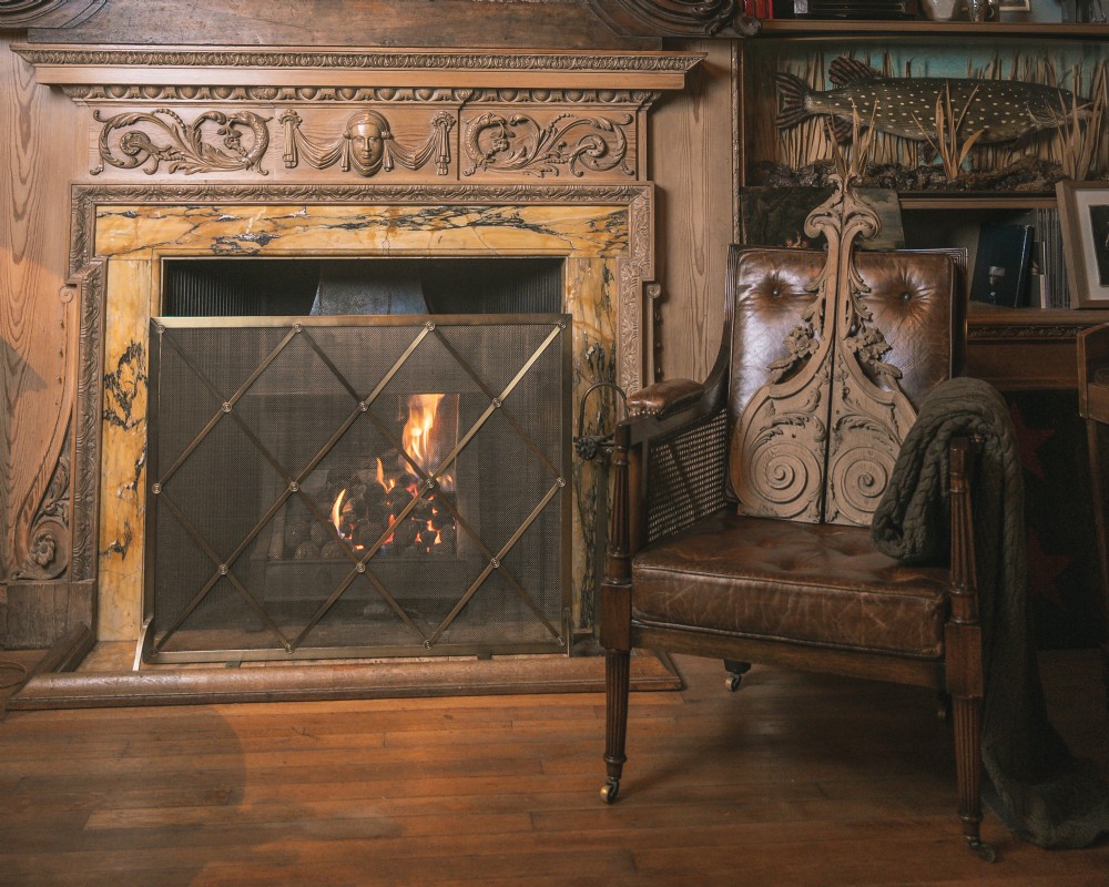 A symmetrical pair of hand-carved 18th-century limewood wall appliques featuring acanthus foliage, flower blossoms, and C-scroll details. View II
