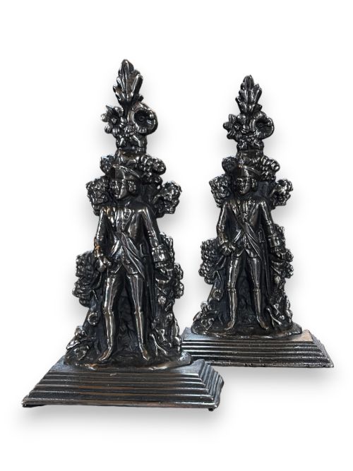 Pair of Polished cast iron door porters, in the form of soldiers.