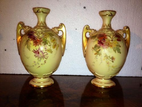 Pair of Hand Painted on Blush Ground Antique Royal Worcester Vases 
Dated 1894 
7 Ins Tall
 
