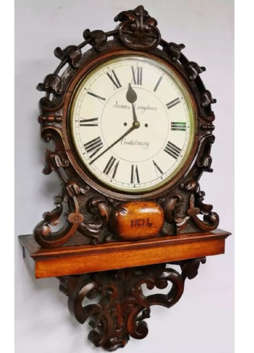 fig 2. An exceptional large antique carved bracket style wall clock.