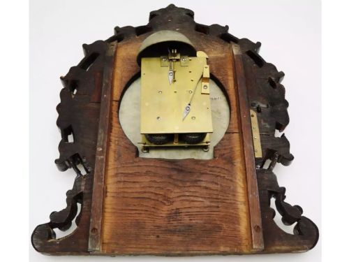 fig 5. An exceptional large antique carved bracket style wall clock.