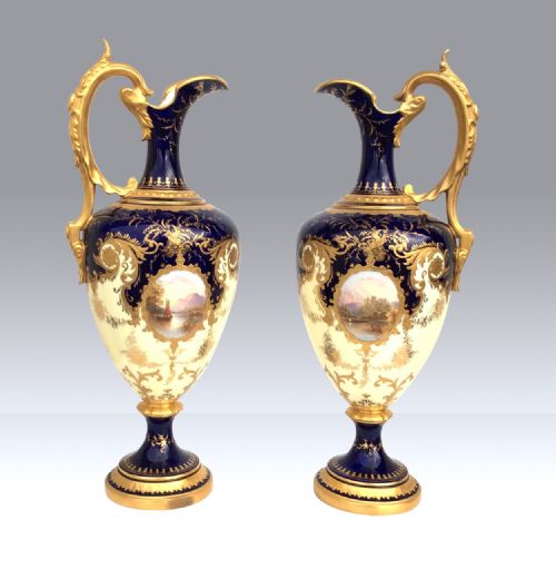 Pair of Antique Coalport Ewers.