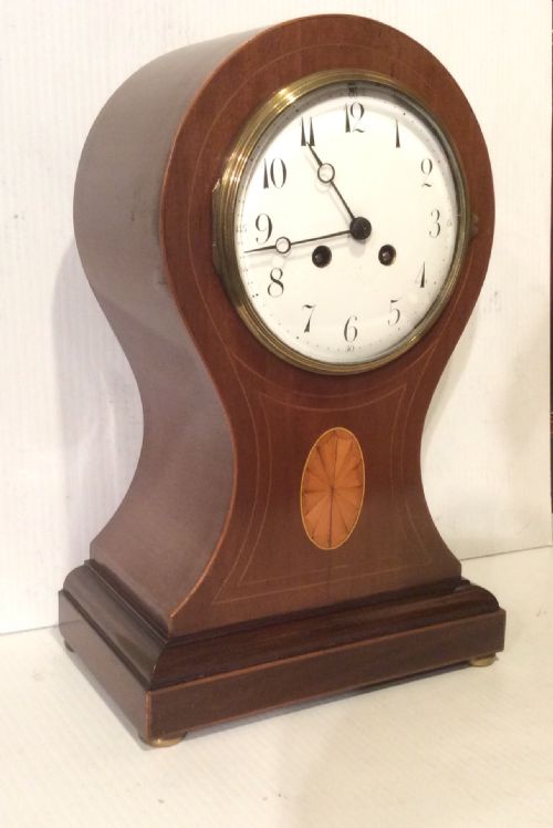 fig 1. Antique Inlaid mahogany balloon shaped Sheridan style mantel clock 