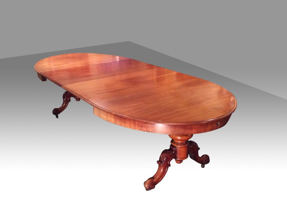 Antique Victorian extending pedestal  oval mahogany dining table.