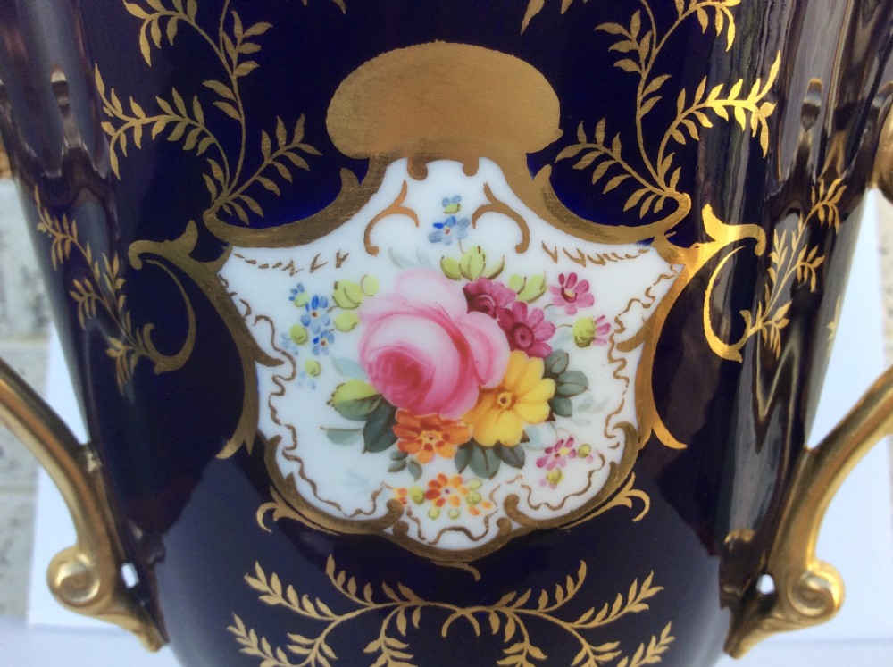 A stunning large antique Coalport three handled chalice cup. View V