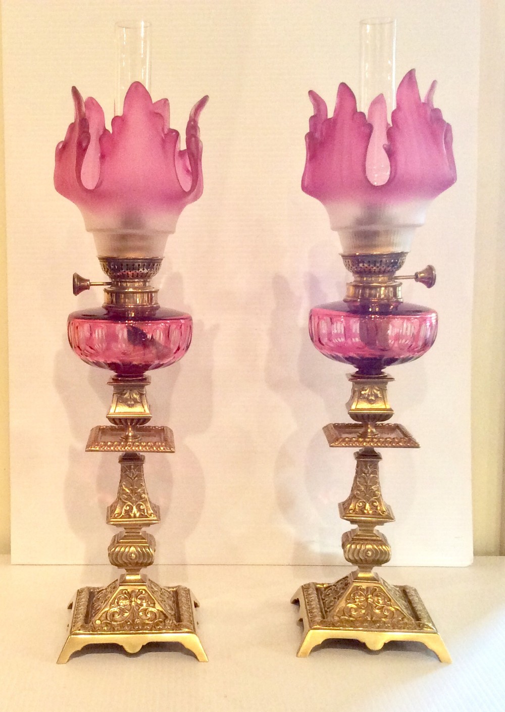 Stunning Matching  Pair Of Original Antique Ruby Glass Oil Peg Lamps .