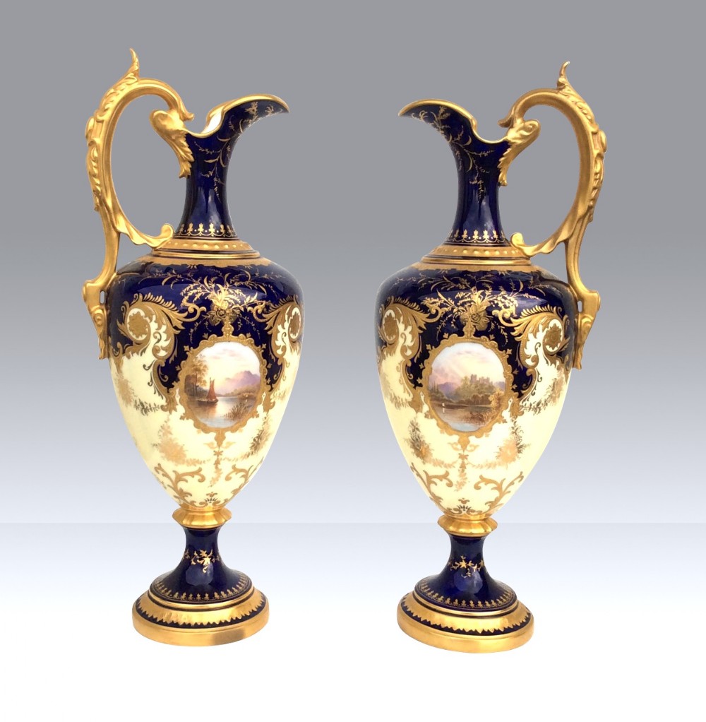 Pair Of Antique Coalport Ewers.