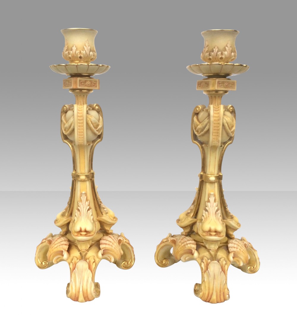 Pair of antique Royal Worcester blush ivory candlesticks.