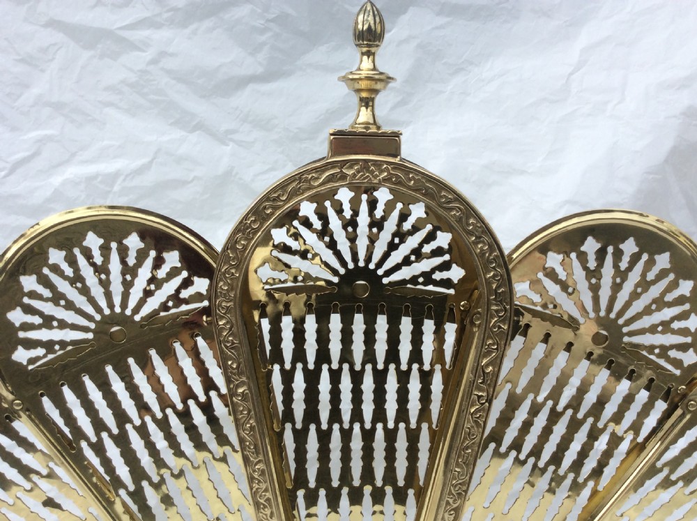 A beautiful French, ornate, antique  brass folding fan fire screen. View IV