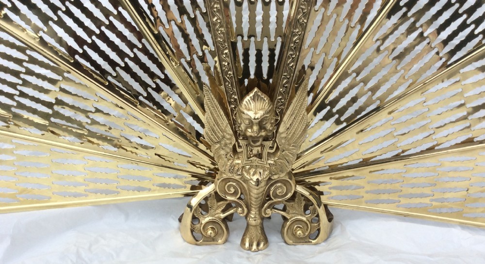 A beautiful French, ornate, antique  brass folding fan fire screen. View VI