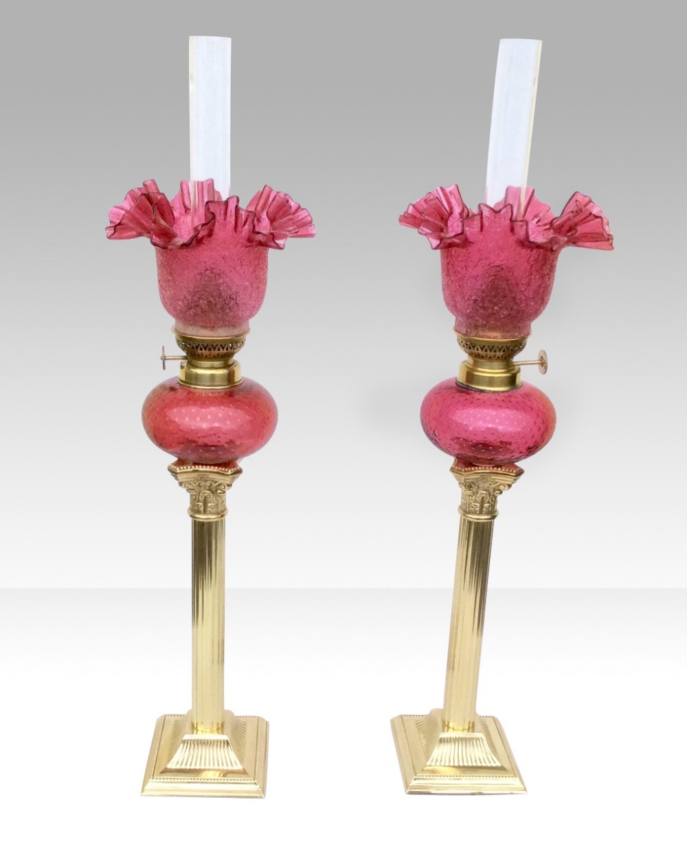 Pair Of Ruby Glass Peg Oil Lamps 