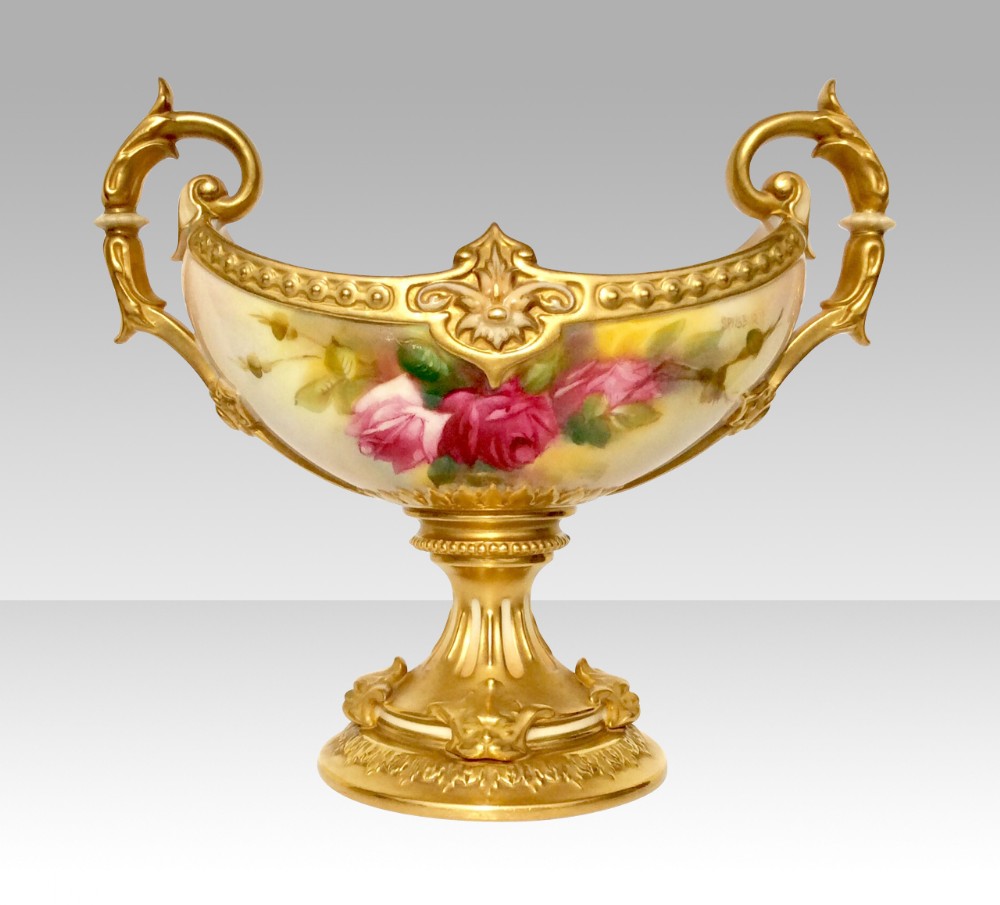 Antique Royal Worcester  boat shaped twin handled pedestal vase.
