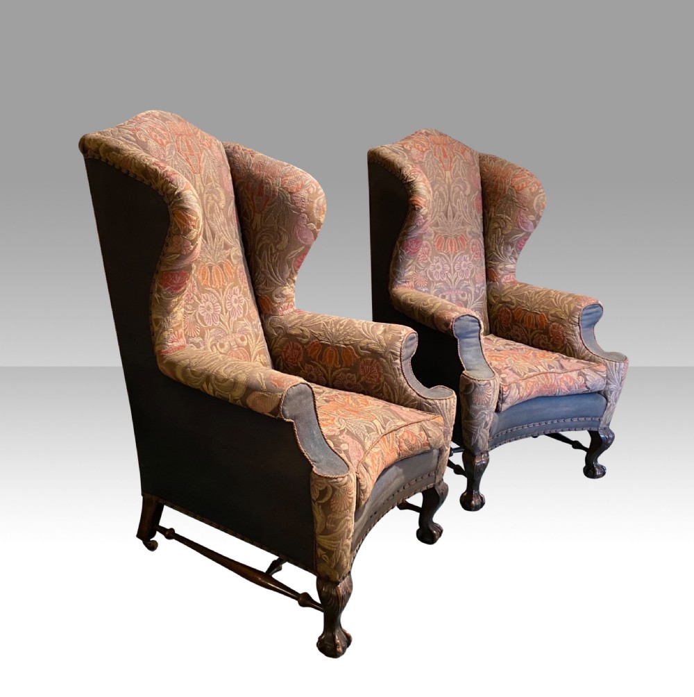 Pair of large wingback armchairs 